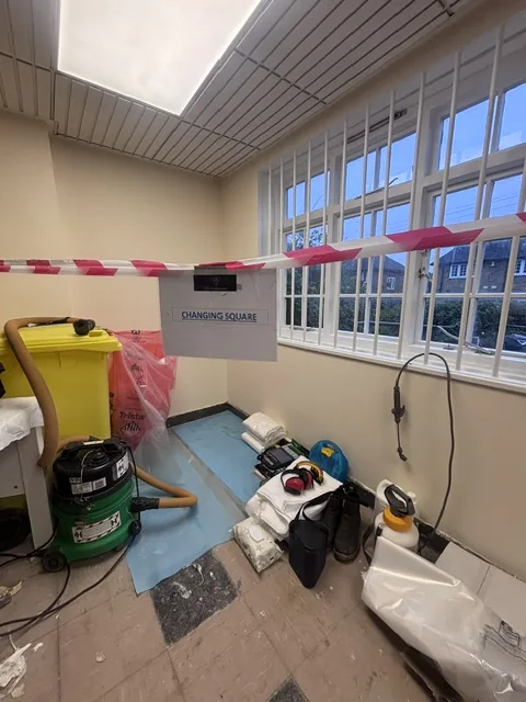 Asbestos floor tile and bitumen removal in Hanwell