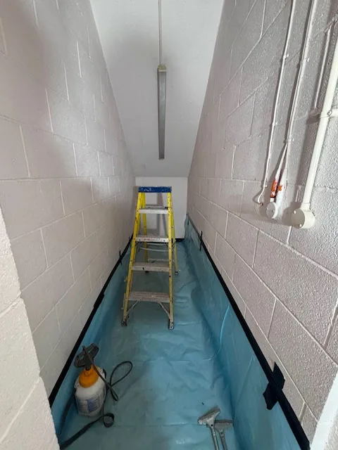HSE-licensed asbestos gasket strip-out in W7
